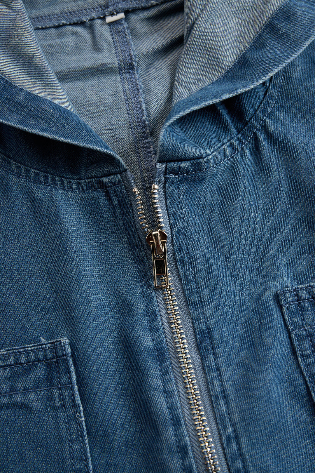 Women’s Denim Jumpsuit with Hooded Collar and Zipper Closure