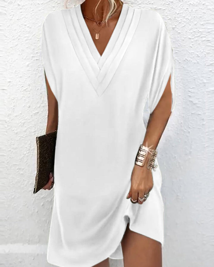 Women’s Dress with Slit Sleeves and Solid Color